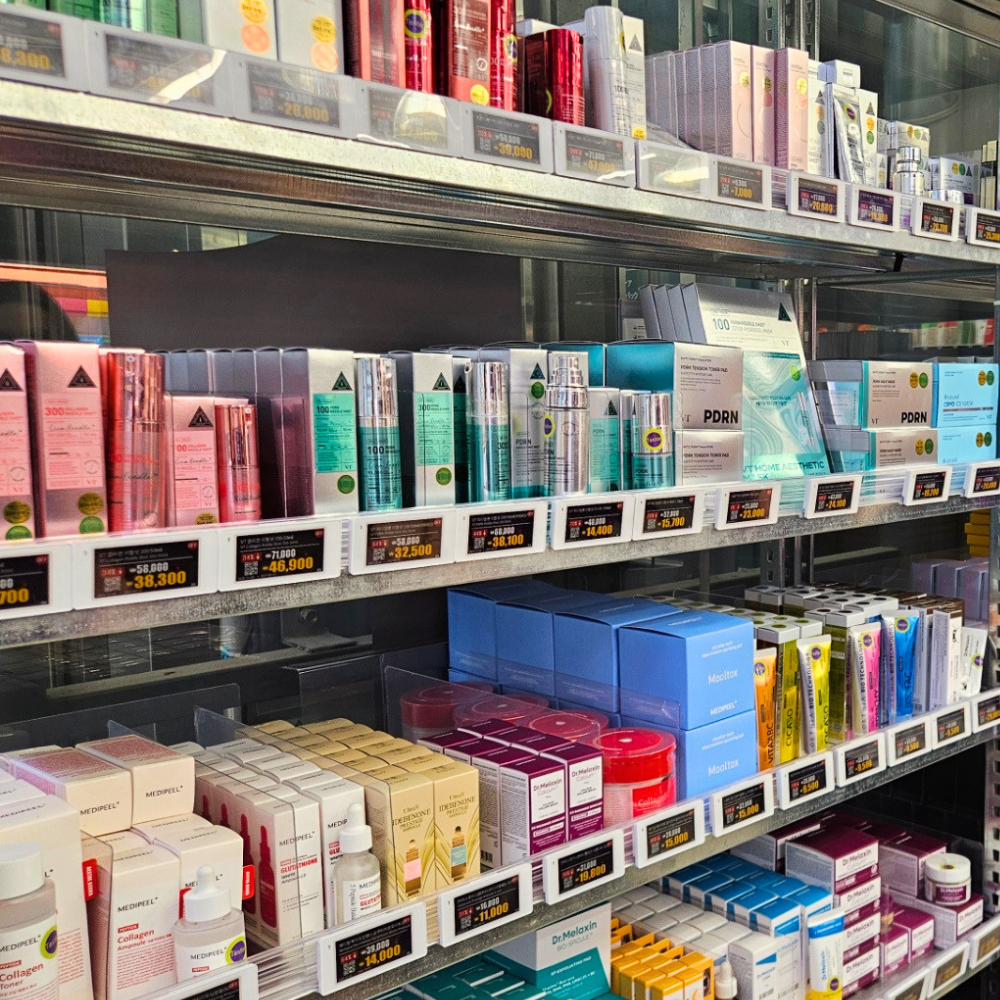 Daiso Korea beauty aisle displaying cosmetics and skincare brands under 5,000 won